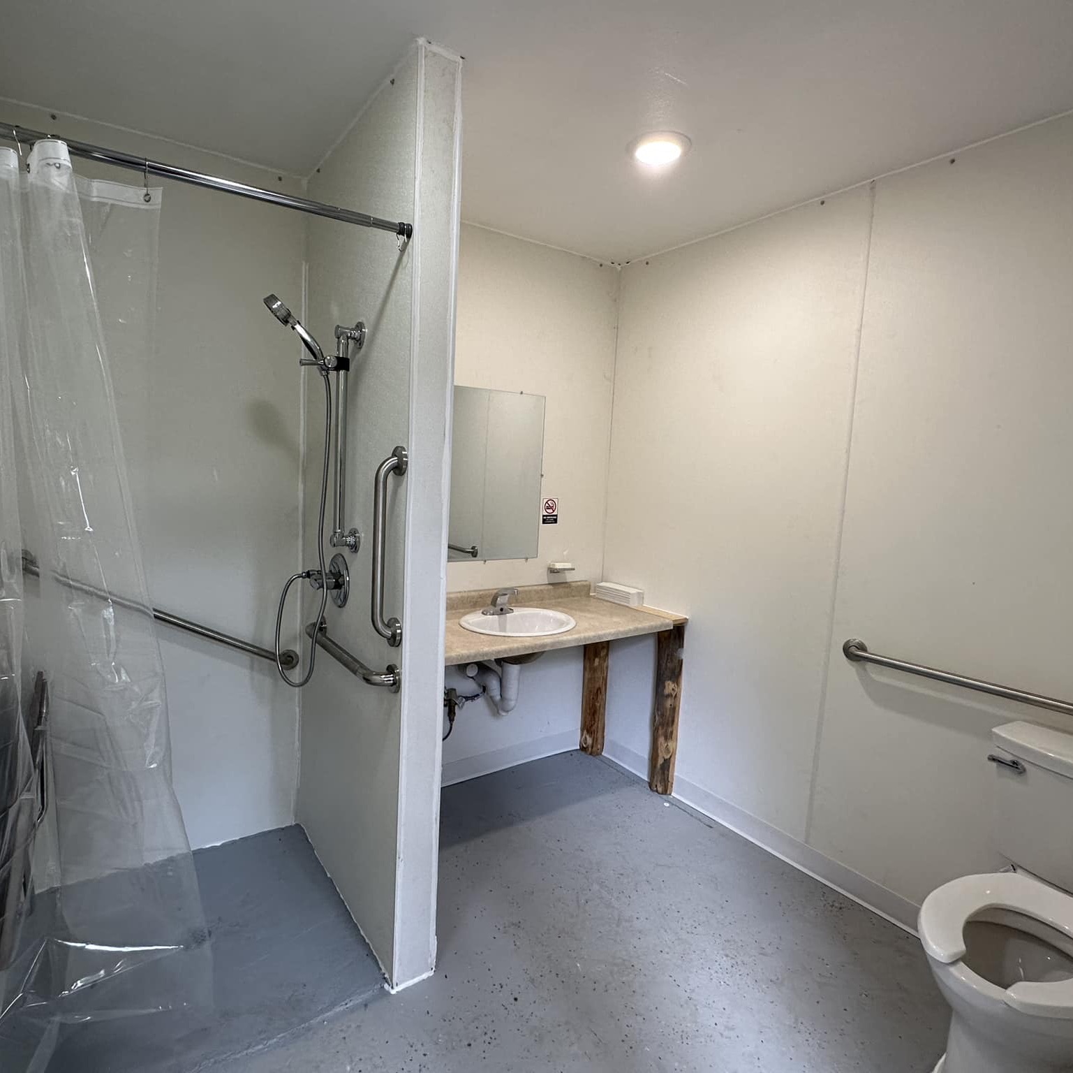 Photo of a bathroom and the shower