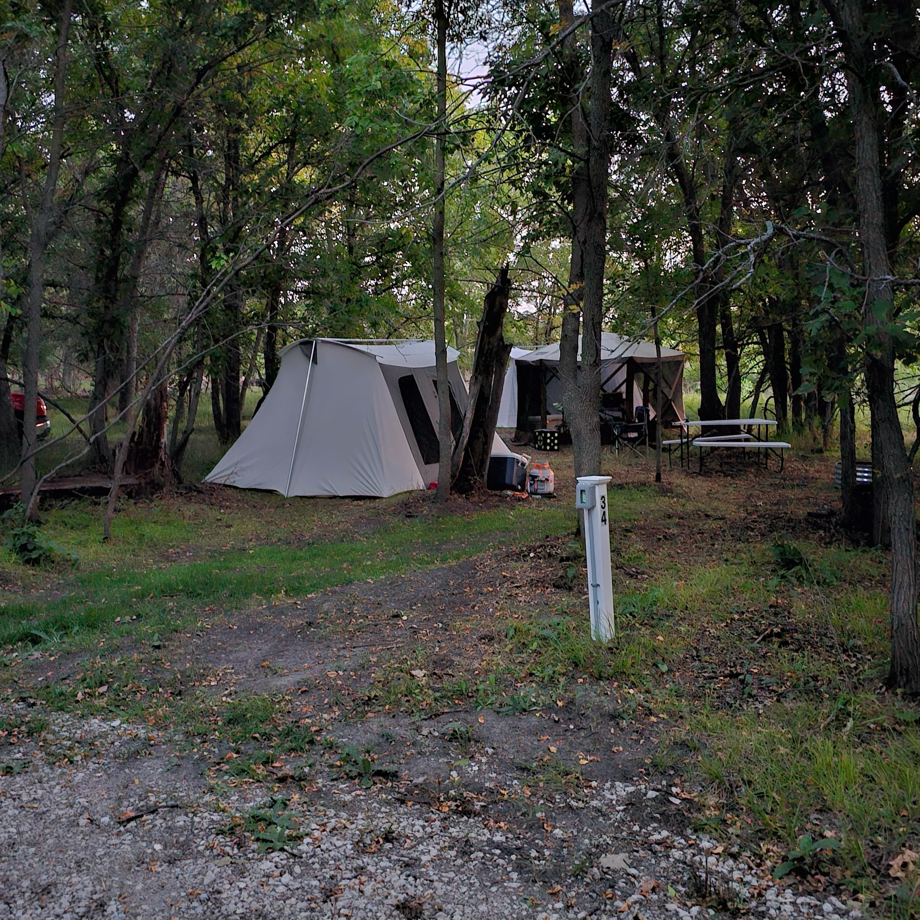 A tent set up on a campsite